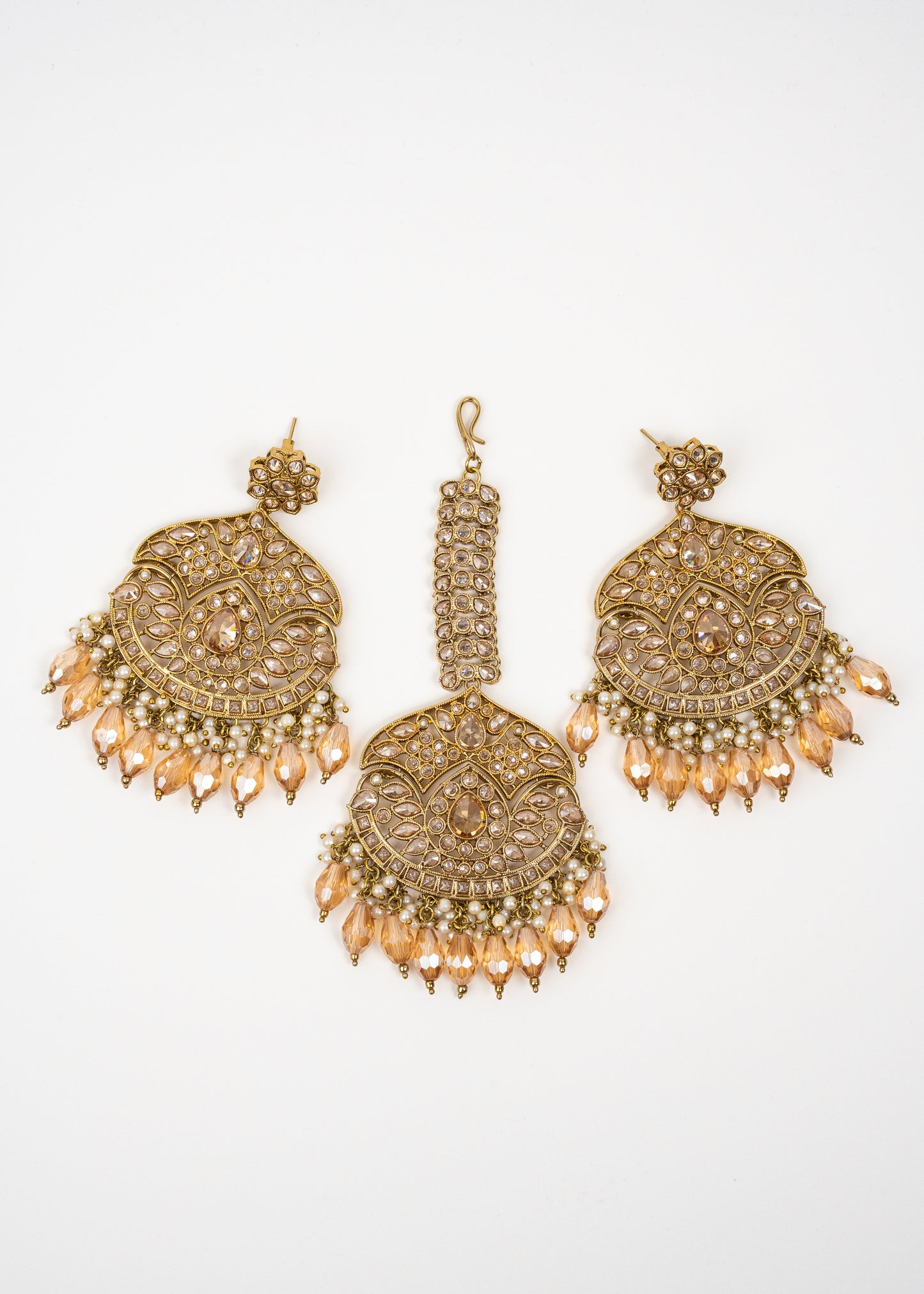 Peach Glow Jhumka Set with Golden Tones
